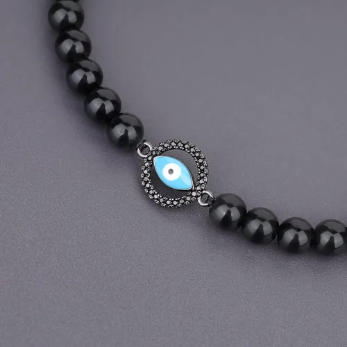 Vista 5 de COAI Pulsera con cuentas de piedra de obsidiana negra con dije de mal de ojo