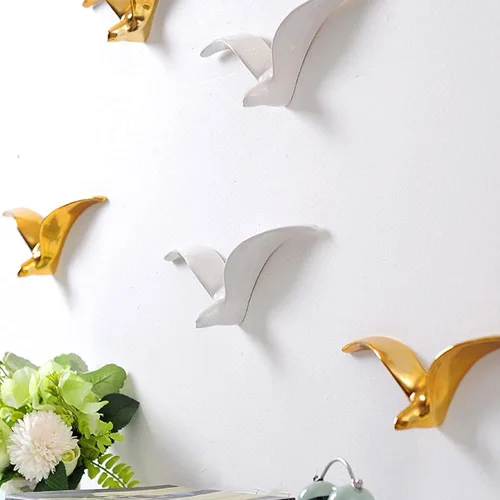 Vista 5 de La La Pet® Decoración de pared de ganso salvaje, esculturas de pájaros voladores de cerámica, adorno de pared 3D, decoración costera para colgar