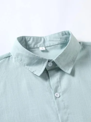 Vista 3 de OYOANGLE Camisa de manga corta con botones para hombre, ajuste regular, para trabajo, casual, color liso