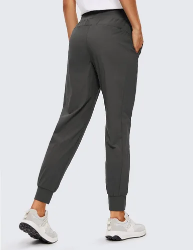 Vista 2 de CRZ YOGA Pantalones deportivos de cintura alta con bolsillos para mujer, de 27.5 pulgadas, ligeros, para entrenamiento, viajes, uso casual, al aire