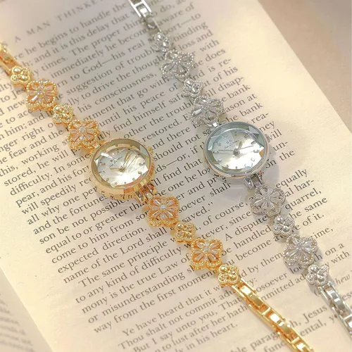 Vista 5 de Exquisito reloj de pulsera de trébol de cuatro hojas doradas huecas para mujer, relojes de vestir vintage, reloj de pulsera de cuarzo ligero