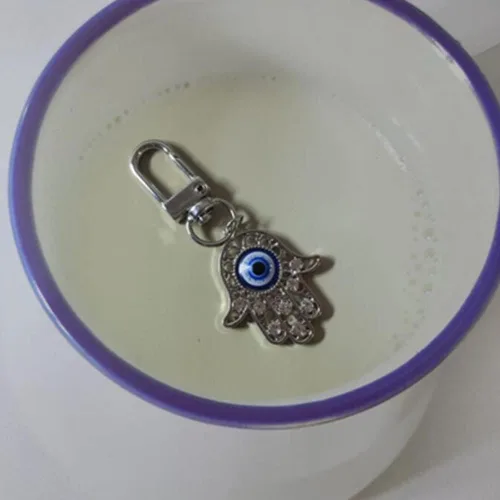 Vista 5 de Llavero Hamsa de cristal de ojo malvado, dije de diamantes de imitación, llavero de mano de Fátima para bolso y monedero con clip, adorno