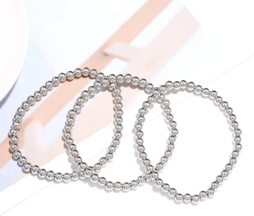 Vista 5 de Pulseras de cuentas para mujer apiladas elásticas doradas plateadas pequeñas cuentas de bola delicadas pulseras de eslabones Figaro para él y ella