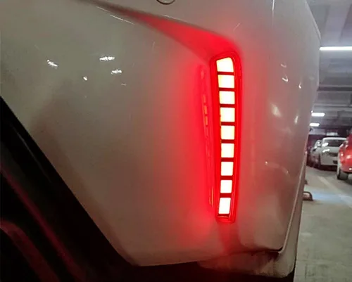 Vista 7 de iJDMTOY Luces reflectoras de parachoques LED de lente roja compatibles con Toyota Corolla Sedán 2019-22, funciona como faros antiniebla traseros