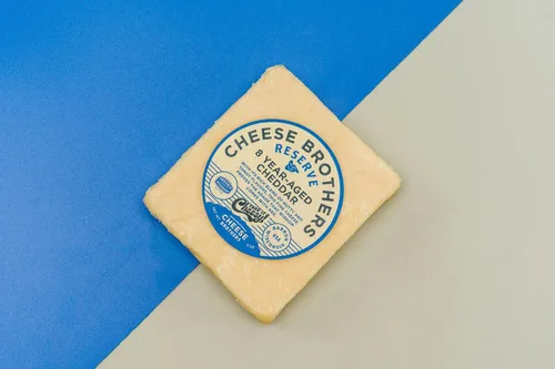Vista 9 de Cheese Bros. Queso cheddar Hecho en Wisconsin (Cheddar ahumado, 12 unidades)