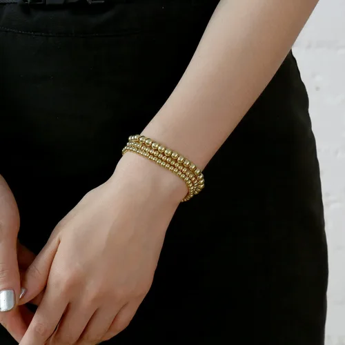 Vista 4 de Elegance 11 diseños - Pulseras de cuentas con bolas chapadas en oro de 14 quilates, elásticas y extensibles, pulseras con cuentas de oro para mujer