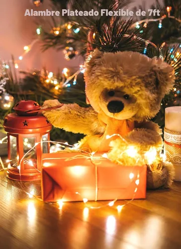 Vista 4 de Minetom - Paquete de 12 luces LED con pilas para decoración navideña Blanco cálido