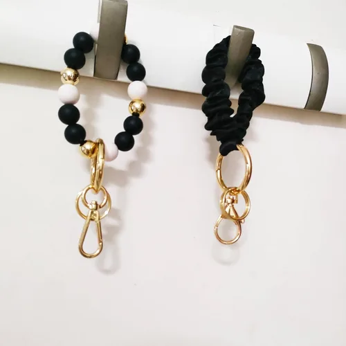 Vista 7 de Llavero de silicona con cuentas para mujer, pulsera elástica para llavero