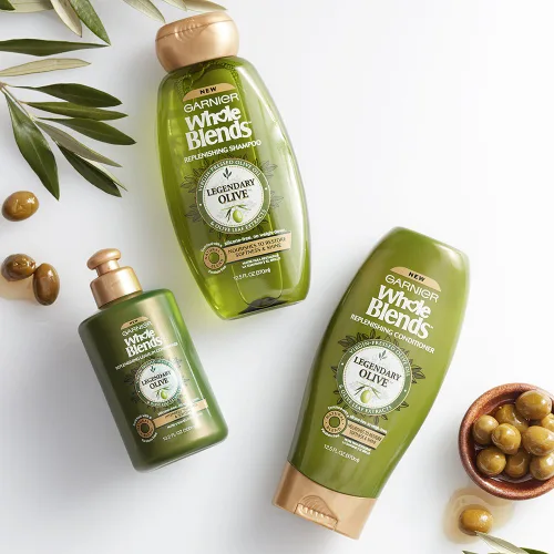 Vista 4 de Acondicionador Garnier Whole Blends legendario de oliva, para cabello seco, 12.5 fl. oz.