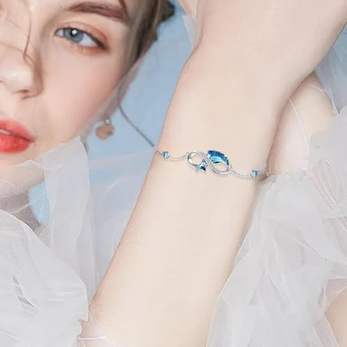 Vista 4 de Pulsera de delfín para mujer, de plata de ley, tobilleras de delfín, impermeables, hipoalergénicas, dijes de cristal, regalo único de Navidad