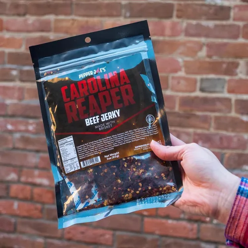 Vista 4 de Pepper Joe's Carolina Reaper Beef Jerky – Cecina de res picante peligrosamente deliciosa con pimienta más picante del mundo y cortes de pechuga