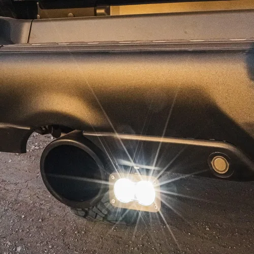 Vista 2 de Baja Designs S2 Sport - Kit de luces LED de doble marcha atrás para Dodge Rebel 1500 2019-23 camión (conducción/combinado; transparente)
