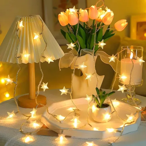 Vista 8 de ANJAYLIA 20 luces LED de cadena de estrellas de 10 pies, luces de hadas de Navidad operadas con batería para decoración interior y exterior, fiesta