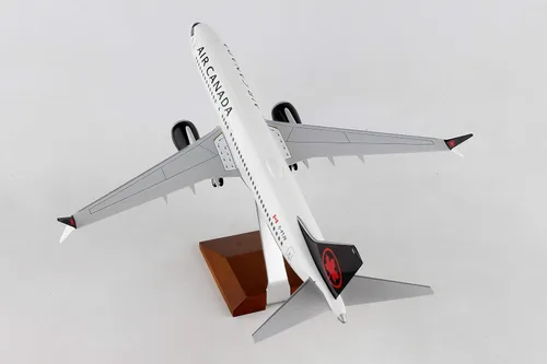 Vista 11 de Daron Skymarks Air Canada 737MAX8 1/100 con soporte de madera y engranaje