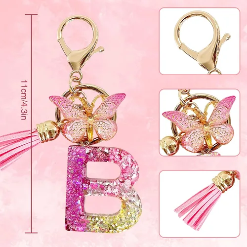 Vista 2 de Yanmucy Llaveros de letras para mujer, de la A a la Z, bonitos llaveros de mariposa con borla de cristal del alfabeto, llavero inicial para mochila