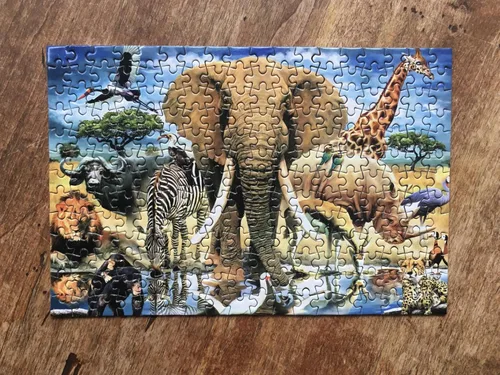 Vista 3 de TDC Games Rompecabezas más pequeño del mundo, Oasis africano - Mini rompecabezas, pequeño rompecabezas de arte de viaje desafiante para adultos, más