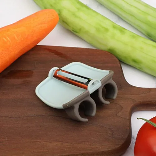Vista 4 de HEMOTON 3 unids dedo melón rallador Veg Peeler Face Raspador Herramienta Pelador de patatas Dedo Pelador Naranja Patata Raspador Multifunción Palma