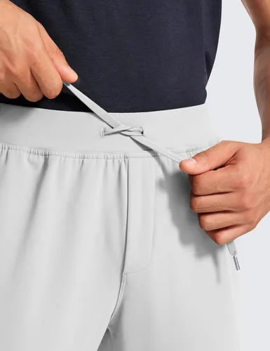 Vista 4 de CRZ YOGA Pantalones deportivos elásticos en 4 direcciones para hombre, de 30 pulgadas, para entrenamiento, casual, con bolsillo con cremallera