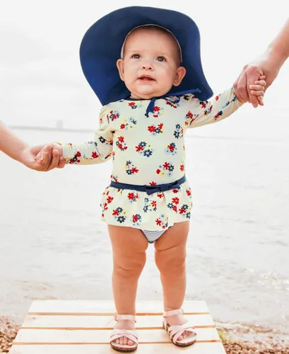 Vista 2 de RuffleButts - Gorro de sol para bebés y niñas pequeñas con protección solar UPF 50+ y ala ancha