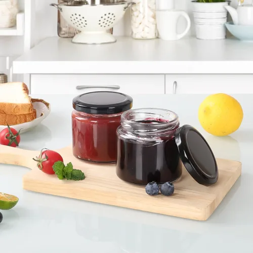 Vista 4 de Paquete de 24 tarros de vidrio de 5 onzas con tapas, tarros pequeños transparentes de 5.1 fl oz con 24 calcomanías, mini tarro de conservas