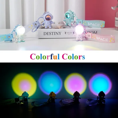 Vista 4 de YOU WIZV Llavero de astronauta, lindos llaveros Kawaii de anime geniales para mochilas, llaveros espaciales con luz de puesta de sol para mujeres