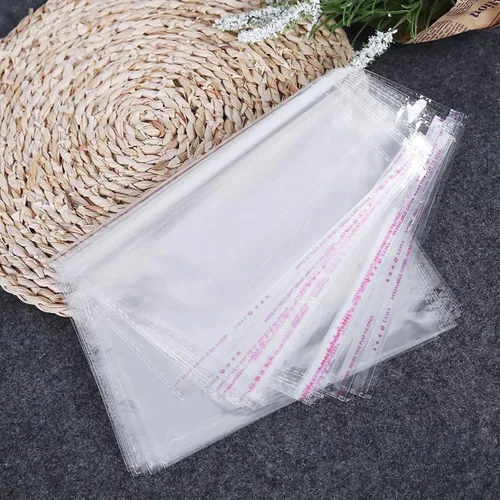 Vista 7 de Bolsas de celofán transparentes autoadhesivas para ropa, 14 x 20 pulgadas, grandes bolsas de polietileno OPP sellables, 100 unidades para ropa