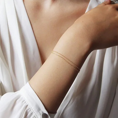 Vista 3 de Pulsera de cadena de elegante oro para mujer, pulseras de cadena individual o en capas, con eslabón de dije de corazón, karma, triángulo, perlas