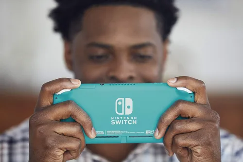 Vista 6 de Nintendo Switch Lite - Turquoise (Renewed Premium)