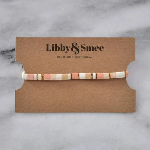 Vista 2 de Pulsera elástica con cuentas de azulejos de 7 pulgadas color crema rubor y oro beige