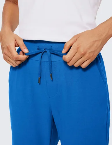 Vista 3 de CRZ YOGA Pantalones deportivos de cintura alta con bolsillos para mujer, de 27.5 pulgadas, ligeros, para entrenamiento, viajes, uso casual, al aire
