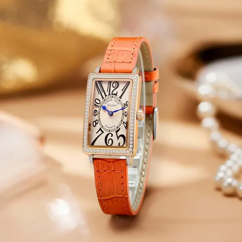 Vista 3 de Reloj rectangular de oro rosa para mujer con bisel de piedra blanca y esfera naranja, marcadores numéricos irregulares de hora, reloj de pulsera