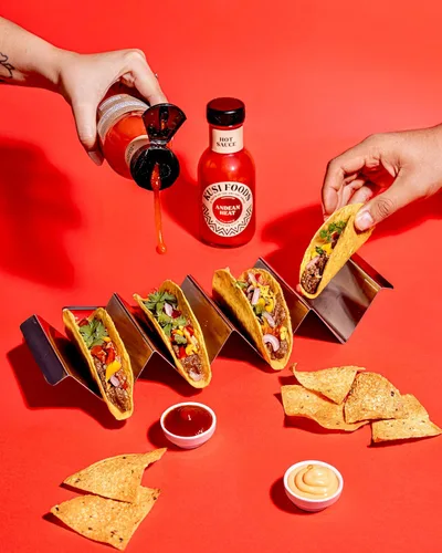 Vista 8 de Kusi Foods ANDEAN HEAT Salsa picante peruana, hecha con chile limusina, pimientos rojos, vinagre y sal, cítricos, picante y ligeramente dulce