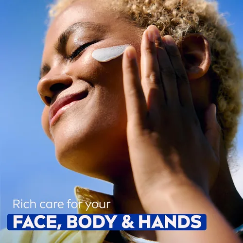 Vista 7 de NIVEA Crema hidratante para el cuerpo, la cara y las manos, fórmula alemana, rica crema hidratante corporal con provitamina B5, lata de 8.4 onzas