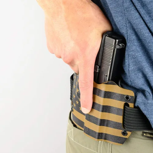 Vista 5 de Fundas OWB negras con trabillas para cinturón integradas para más de 150 pistolas diferentes. Versiones izquierda y derecha disponibles.