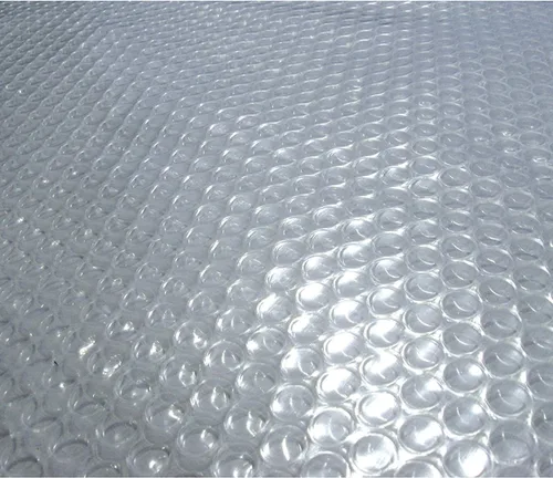Vista 4 de Manta solar para albercas enterradas, de la marca Blue Wave, rectangular, transparente, hecha de 14-MIL, Transparente