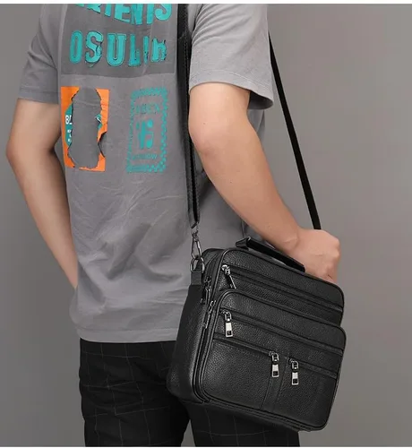 Vista 5 de Maletín de cuero genuino para hombre, bolsa de hombro para oficina de negocios con bolsillos con cremallera, color negro