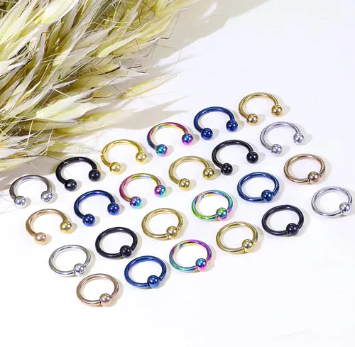 Vista 6 de Kridzisw 24 anillos de acero quirúrgico de 12 G con cuentas cautivas para la nariz tabique ceja labio pezón lengua ombligo joyería para mujeres