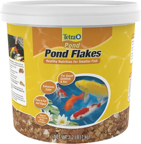 Vista 5 de Tetra Pond PondFood - Escamas de color para estanques, alimentos para peces en escamas que mejoran el color para estanques pequeños, 6 onzas (77021)