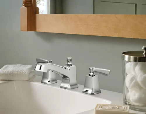 Vista 2 de Grifo de lavabo de baño Moen Conway cromado de dos manijas extendido con válvula incluida, 84926