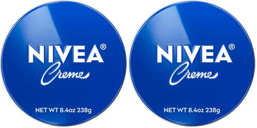 Vista 17 de NIVEA Crema hidratante para el cuerpo, la cara y las manos, fórmula alemana, rica crema hidratante corporal con provitamina B5, lata de 8.4 onzas