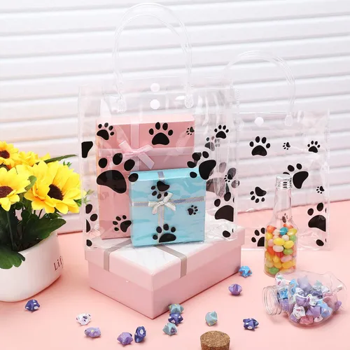 Vista 4 de Teling Paquete de 20 bolsas de regalo de PVC transparente con asa de perro con asa, bolsas de plástico reutilizables transparentes para cachorros