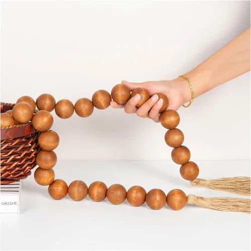 Vista 103 de OMISHE Guirnalda de cuentas de madera extra grande con cuentas de madera y borlas de 1.6 pulgadas de diámetro, cuentas decorativas rústicas de 41