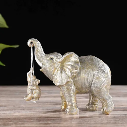 Vista 3 de BRASSTAR Estatua de elefantes de plata de resina bebé elefante sentado en columpio figura traer suerte felicidad riqueza decoración del hogar 7.1