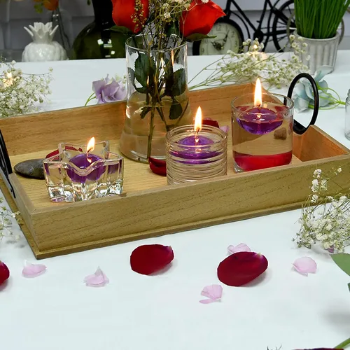 Vista 5 de Zest Candle Velas flotantes de 12 piezas, 1.75 pulgadas, gel morado transparente