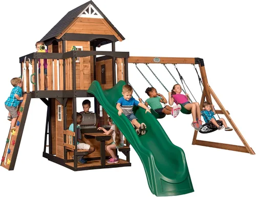 Vista 2 de Conjunto de columpios Backyard Discovery Canyon Creek de madera de cedro con tobogán de ola, casa de juegos, cocina de juego, área de picnic