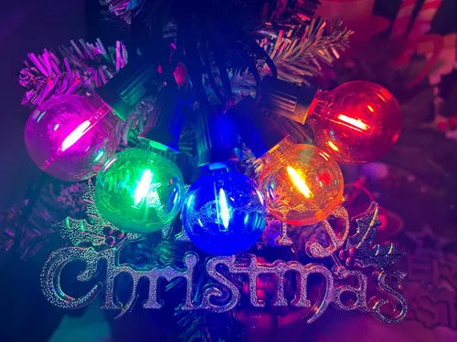Vista 7 de Paquete de 25 bombillas LED multicolor G40 de repuesto de Navidad, 1 vatio, base de candelabro E12/C7, bombillas LED Edison inastillables