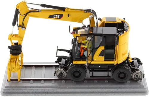 Vista 9 de Diecast Masters Excavadora con ruedas para ferrocarril Caterpillar M323F a escala 1:50 - Versión amarilla de seguridad Camiones para gatos