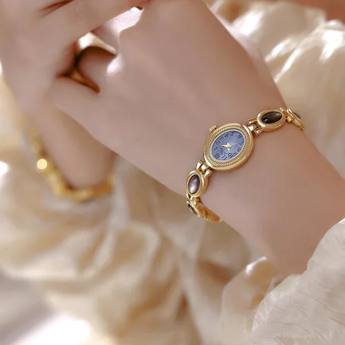 Vista 6 de CARLIEN Reloj de pulsera de cuarzo ovalado para mujer, de lujo, delicado, dorado, plateado, perla y números arábigos, fácil de leer, resistente al