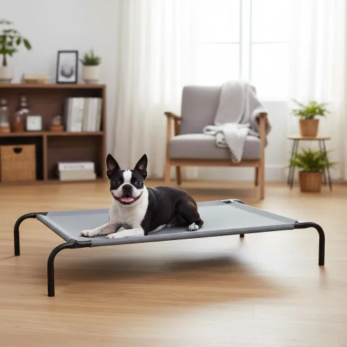 Vista 8 de Amazon Basics Cama elevada transpirable y refrescante para perros con marco de metal para perros grandes, 51 x 31 x 8 pulgadas, color gris