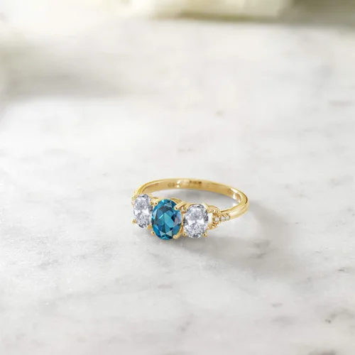 Vista 4 de Gem Stone King Anillo de compromiso de oro amarillo de 10 quilates con topacio azul Londres y topacio blanco para mujer piedra natal ovalada de 222